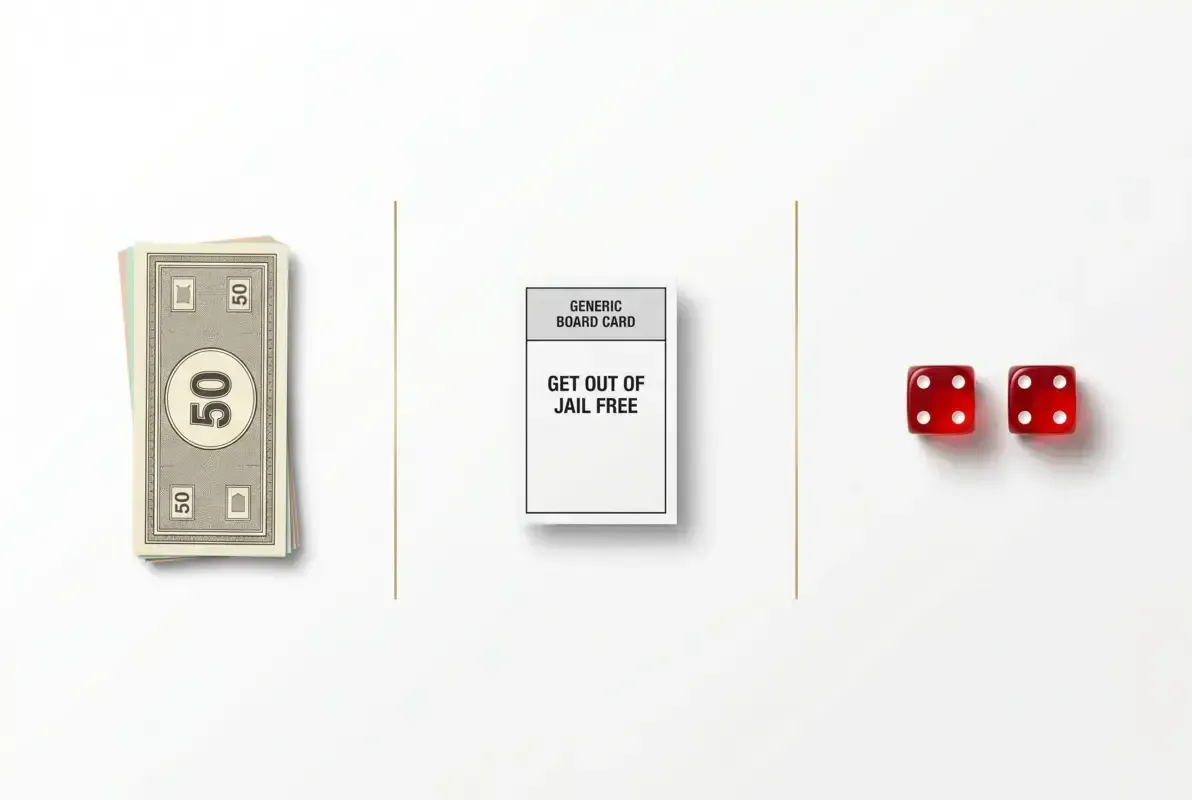Three ways out of jail in Monopoly — fifty dollar bill, Get Out of Jail Free card, and dice showing doubles