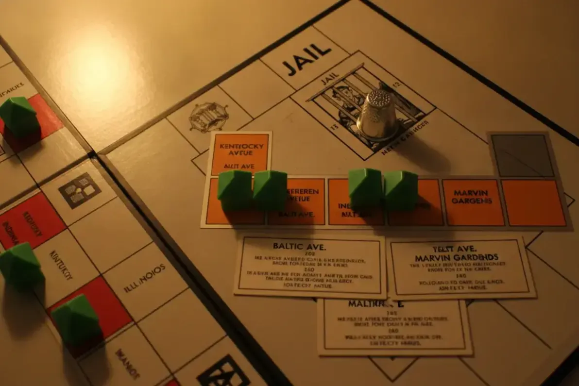 Orange Monopoly properties St. James Place, Tennessee Avenue, and New York Avenue with houses